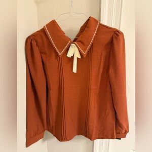 Chic Rust Blouse with White Detailing